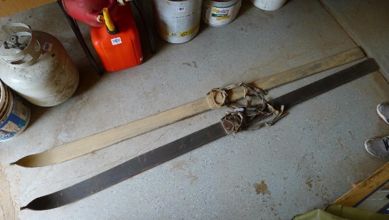 Vintage wooden skis would look great on your wall. Also includes a ski pole. Skis are almost 7'