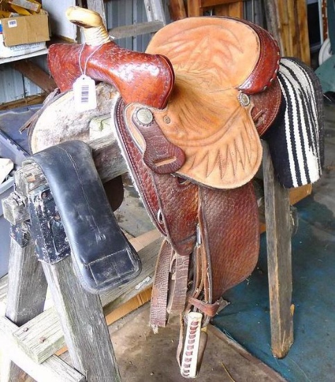 Royal King 15" youth leather saddle with belly strap and saddle blanket in good condition.