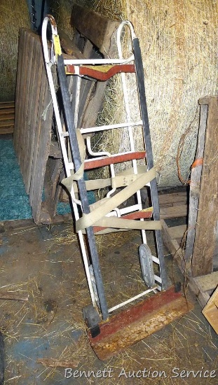 Moving dolly is about 5' x 17" x 12" at it's widest. Rubber is loose in a few places.