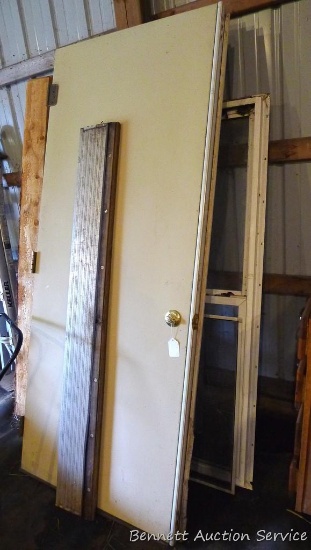 2 doors and 2 sliding windows, more. Top door is about 33" x 79". Largest window is 38" x 64-1/4"