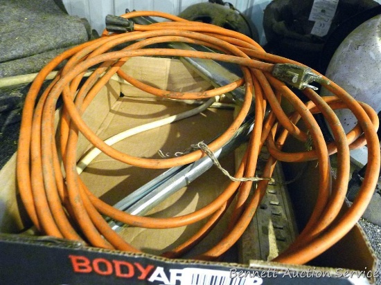 Power strip, extension cords, and shelf brackets. Extension cords are in good condition.