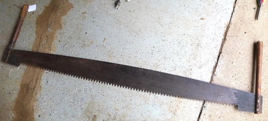 Two-man crosscut saw is about 58" x 16".