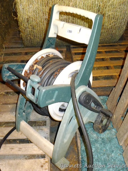 Length of hose on a Suncast Hose-Mobile reel. Reel is about 21" x 21" x 32" tall and looks to be in