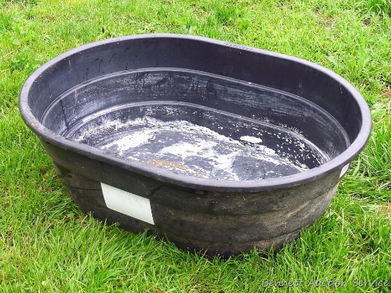Little Giant heavy duty stock tank is about 40" x 29" x 12" tall. No holes noted.