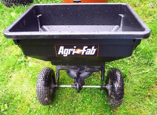 AgriFab pull behind seed spreader; bucket is about 22" x 16" x 12".