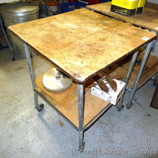 Handy rolling cart has an extra shelf below. Measures approx 24" x 24" x 30" tall. Rolls smoothly.
