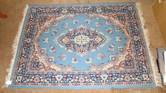 Area rug is 48" x 66". Edges are missing strings. No stains noted, but needs cleaning.