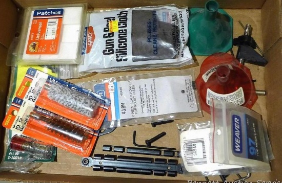 12 gauge snap cap, cleaning brush and mop, universal patches, silicone cloth, reloading funnels,