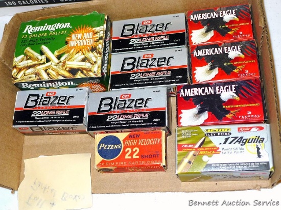 Full and partial boxes of .22LR cartridges, plus a box .17 Aguila - missing one round.