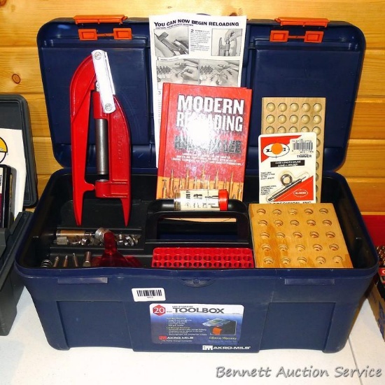 20" lockable tool box containing a Lee Hand Press and more as pictured.