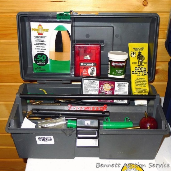16" rust proof lockable tool box with black powder tools and supplies.