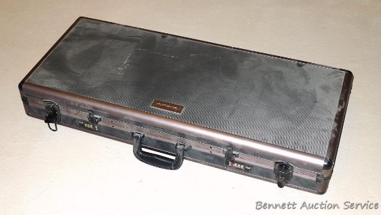 Vanguard padded hard case is 32" x 14" x 5". Triple layer foam to accommodate two layers of guns.
