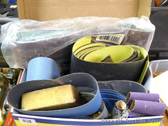Lots of sanding belts and discs, more. Some are NIP. Belts are mostly 3" wide with one pack of 4"