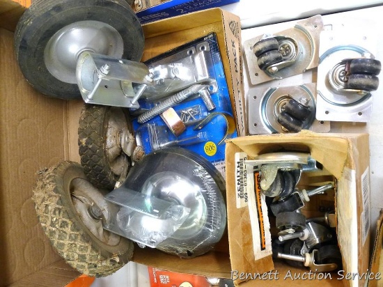 Pair of 8" mounted wheels, 7-3/4" wheels, NIP swinging door latch, 4 swiveling double casters, plus