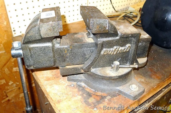 Buffalo No 4 swiveling bench vise is about 8" tall and 14" long when jaws are closed. Jaws look to