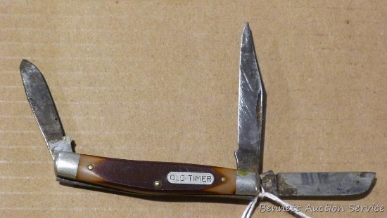Old Timer folding pocket knife has three blades, one marked Schrade NY USA 3401. Some rust noted,