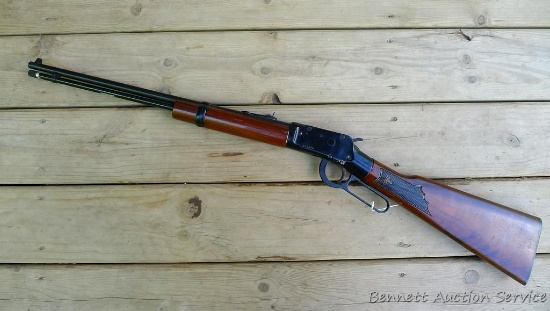 Ithaca M-49R lever action .22 rifle. Action is smooth. 20" barrel has a good bore with fine rifling.