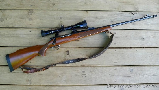 Remington Model 700 bolt action rifle in 7mm Rem Mag. Comes with a muzzle brake, 3-12 scope with