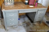 Metal six-drawered desk is about 34