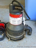 Ace 1/2 HP submersible utility pump, seller says it runs. 10 V, 60 HZ, 4.0 A. Stands about 9