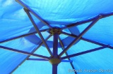 Nice blue solar patio umbrella, no holes noted. Measures approx 56