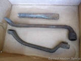 Chisel and 2 open end wrenches. One is marked Ford USA-M-OIA-17017, Chisel is marked ICRR, other