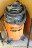 Shop Vac 2 gallon portable wet/dry vac/blower with 1.5 peak HP. Includes hose and attachments.