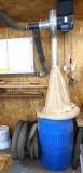 Dust collector system has a Leeson model C6C34FK2C motor, runs. Includes a 55 gal barrel and lots of