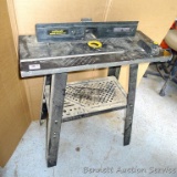 Wolfcraft Router Station 640 comes with a miter. Stands about 32