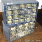 Two metal storage cabinets filled with all sorts of good stuff including washers, screws, nuts,