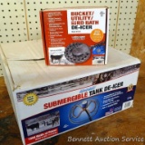 Submergible Tank De-Icer and a Bucket/ Utility/ Bird Bath De-Icer. Both come with boxes but are not