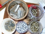 Containers of lead bullets for reloading, most are 9/16
