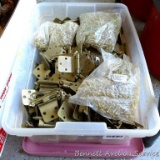 Tote filled with cabinet hinges 2