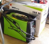 Forney Easy Weld 125 FC flux cored portable wire welder. Welder is 24