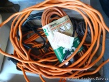 Five extension cords of various lengths.