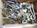 Box of cabinet hinges and door handles. Handles measure 4-1/2