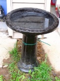 Two piece bird bath appears to be a glazed terra cotta. Stands 23