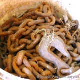 About 4 gallons of assorted chain and hooks up to 3/8