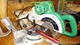 Hitachi C10FSH Slide Compound Saw has a laser marker and comes with manual and 2 attachments. Runs,