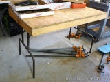 Wooden work table with metal legs is 30