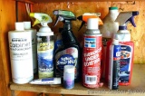 Full and partial containers of Teflon Spray Wax, 409 cleaner, Upholstery stain remover, Rain-X wash
