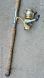 Sturdy St. Croix one-piece fishing rod with a Zebco 6050 reel, eyes look good. Rod is about 7' long