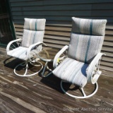 Rocking swiveling deck or porch chairs, plus a glass topped side table.