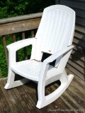 Sturdy weatherproof resin rocking chair is in good shape.