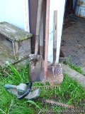 Black & Decker hedge trimmer, spade shovels, planting shovels and a rock rake. Hedge trimmer needs a