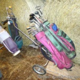 Golf clubs including Senator Gold, Wilson, Lynx and more in Coyote and Gold Eagle golf bags.
