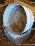 Round and square galvanized washtubs would look great with flowers planted in them. Square one is