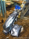 Wilson golf clubs, bag and cart. Includes Apollo, Northwestern and Paragon. Also has covers, balls,