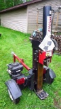 White Outdoor vertical/horizontal wood splitter with 6.5 hp Briggs & Stratton engine. Starts, runs