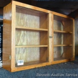 Wonderful wooden display box with doors is about 27-1/2